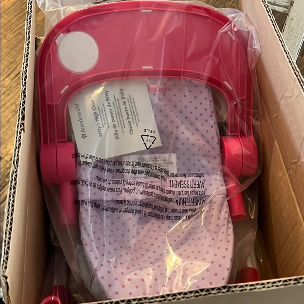 Never opened- bitty baby high chair